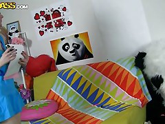 The horny Panda found this time a cutie obsessed with him! This beauty has a poster with panda on the wall and draws a picture of him now. She's so slutty and happy that finally panda visited her but does that babe knows what his intentions are? Well that babe maybe a bit innocent and naive but that's how panda can't live without it!
